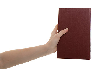 Image showing hand holds a book