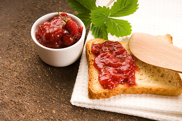 Image showing Wild strawberry jam with toast