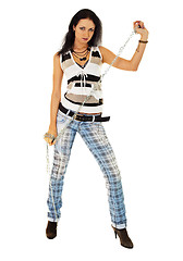 Image showing Young woman in torn jeans with a chain