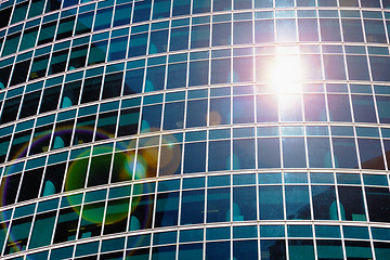 Image showing Abstract view - skyscraper windows and solar flare