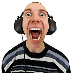 Image showing Funny man in stereo headphones shouting