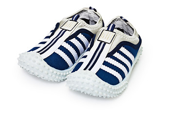 Image showing Sports inexpensive shoes on white