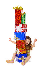Image showing Very happy child enjoys on holiday gifts