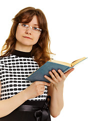 Image showing Young woman in glasses with  textbook