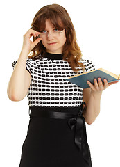 Image showing Young beautiful woman in glasses with a book