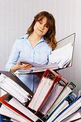 Image showing Female accountant and financial documentation