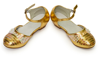 Image showing Elegant golden shoes for girl on white