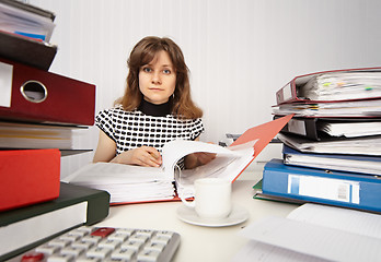 Image showing Female accountant very busy in office