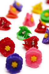 Image showing Small colored plastic hair clips