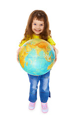 Image showing Cheerful little girl gives us Globe