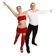 Image showing cheerfully dancing young people on white