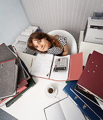 Image showing Young woman - financier on office workplace