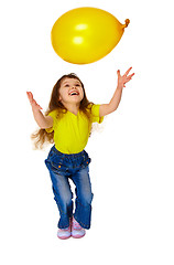 Image showing Little girl chasing balloon on white background