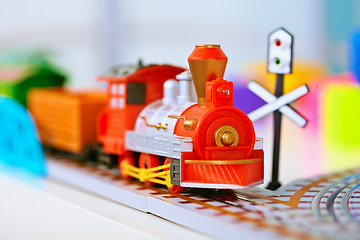 Image showing Toy miniature locomotive on railroad