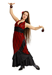 Image showing Young girl in red dress performs Spanish dance