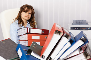 Image showing Tired accountant working overtime in office