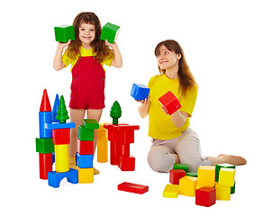 Image showing Mom and daughter playing with blocks