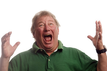 Image showing middle age senior man emotional screaming in shock 