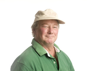 Image showing middle age senior man wearing casual hat smiling
