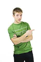 Image showing Young man pointing to the side