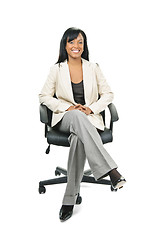 Image showing Black businesswoman sitting in office chair