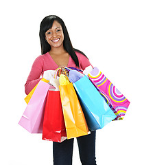 Image showing Happy young black woman with shopping bags