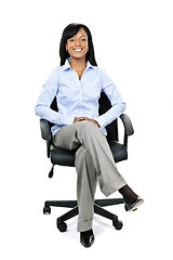 Image showing Businesswoman sitting in office chair