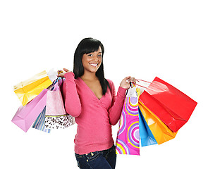 Image showing Happy young black woman with shopping bags