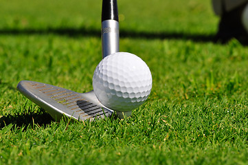 Image showing Golf ball and driver