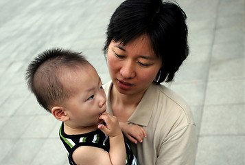 Image showing Asian mother and her baby