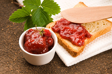 Image showing Wild strawberry jam with toast