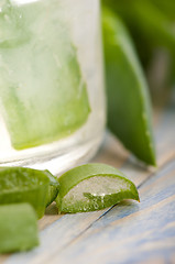 Image showing aloe vera juice with fresh leaves