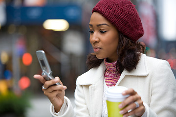 Image showing Business Woman With a Phone and Coffee