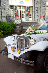 Image showing White vintage wedding car