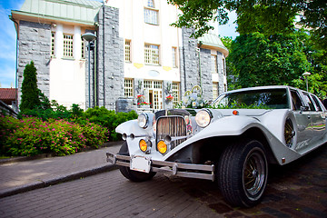 Image showing White vintage wedding limousine 