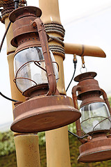 Image showing rust and brocken kerosene lamp 