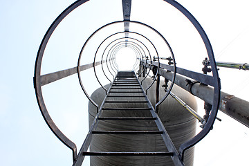 Image showing Stainless steel stairway in the tanks of a modern winery 