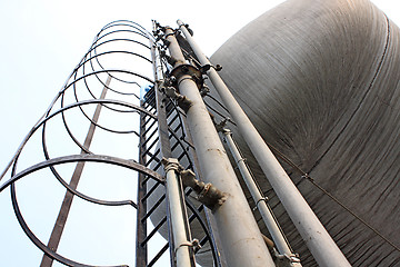 Image showing Stainless steel stairway in the tanks of a modern winery 