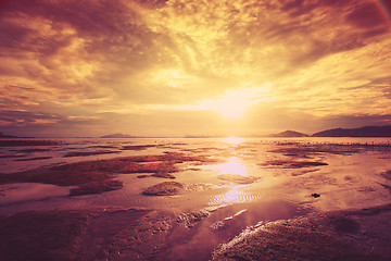 Image showing Tropical sunset on the beach.