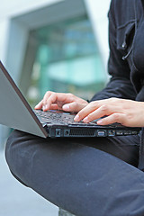 Image showing loseup of a young man working of a laptop 