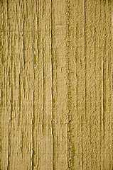 Image showing Yellow paint on wood background