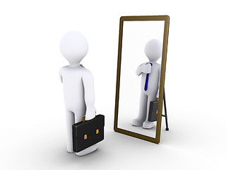 Image showing Businessman looking in the mirror