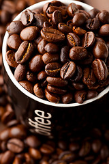 Image showing Coffee mug with coffee beans