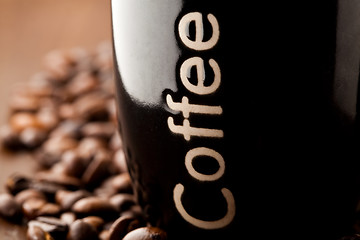 Image showing Coffee beans and a coffee mug