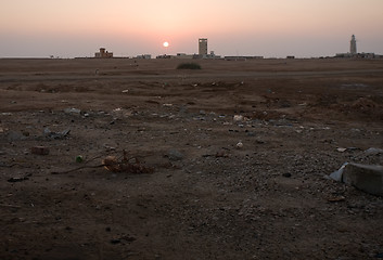 Image showing sunrise in dirty suburb