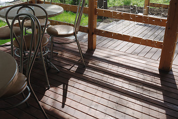 Image showing table and chairs on the terrace 