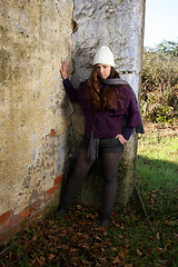 Image showing  beautiful woman in an autumn park 