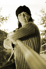 Image showing  beautiful woman in an autumn park 