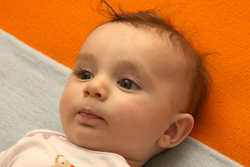 Image showing sweet baby sleeping on a blanket, newborn baby