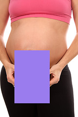 Image showing beautiful pregnant woman with publicity board